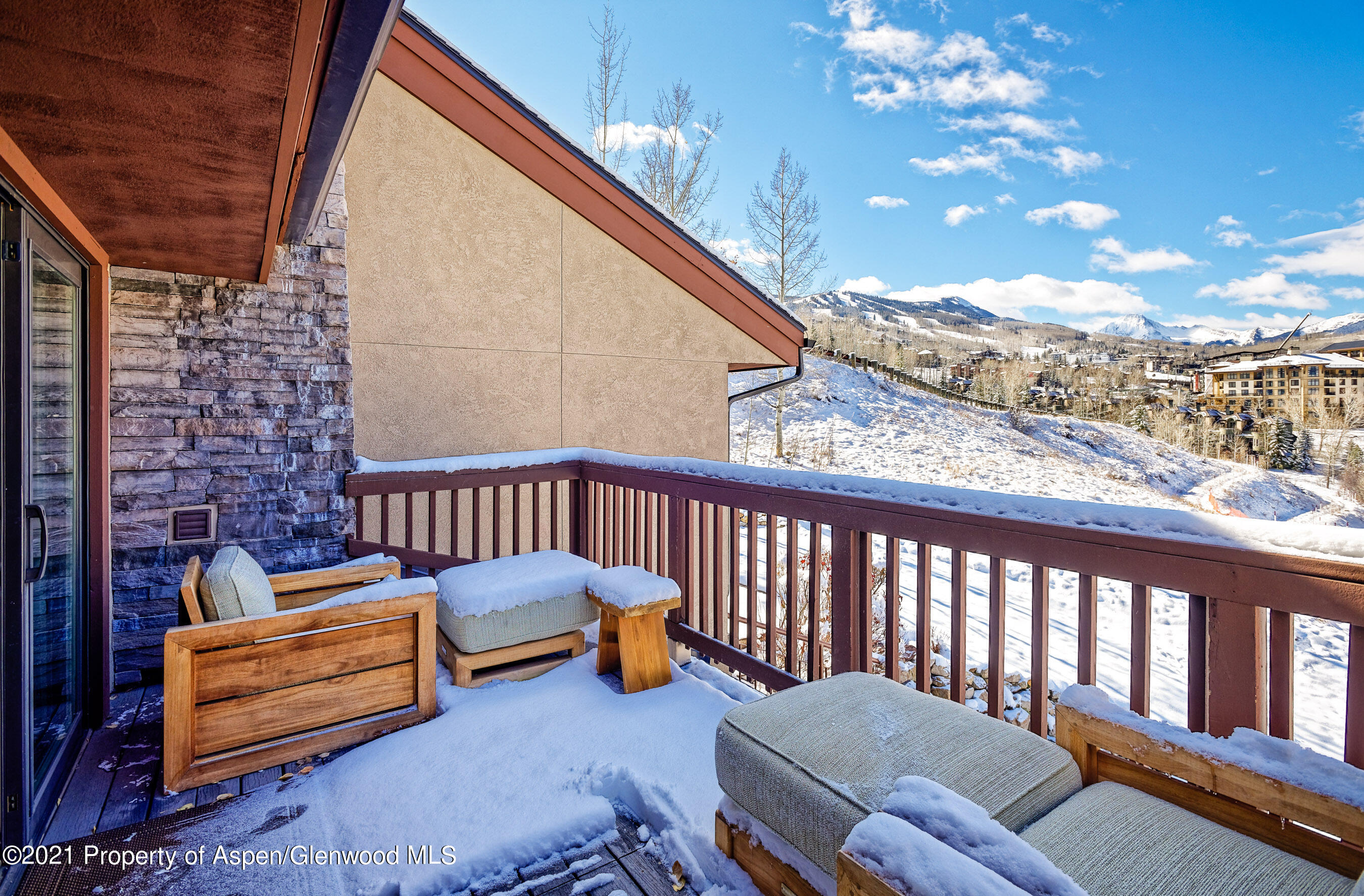 810 Ridge Road, Unit 2 Snowmass Village, CO 81615 - Photo 23 of 31 a view of a two chairs in the balcony