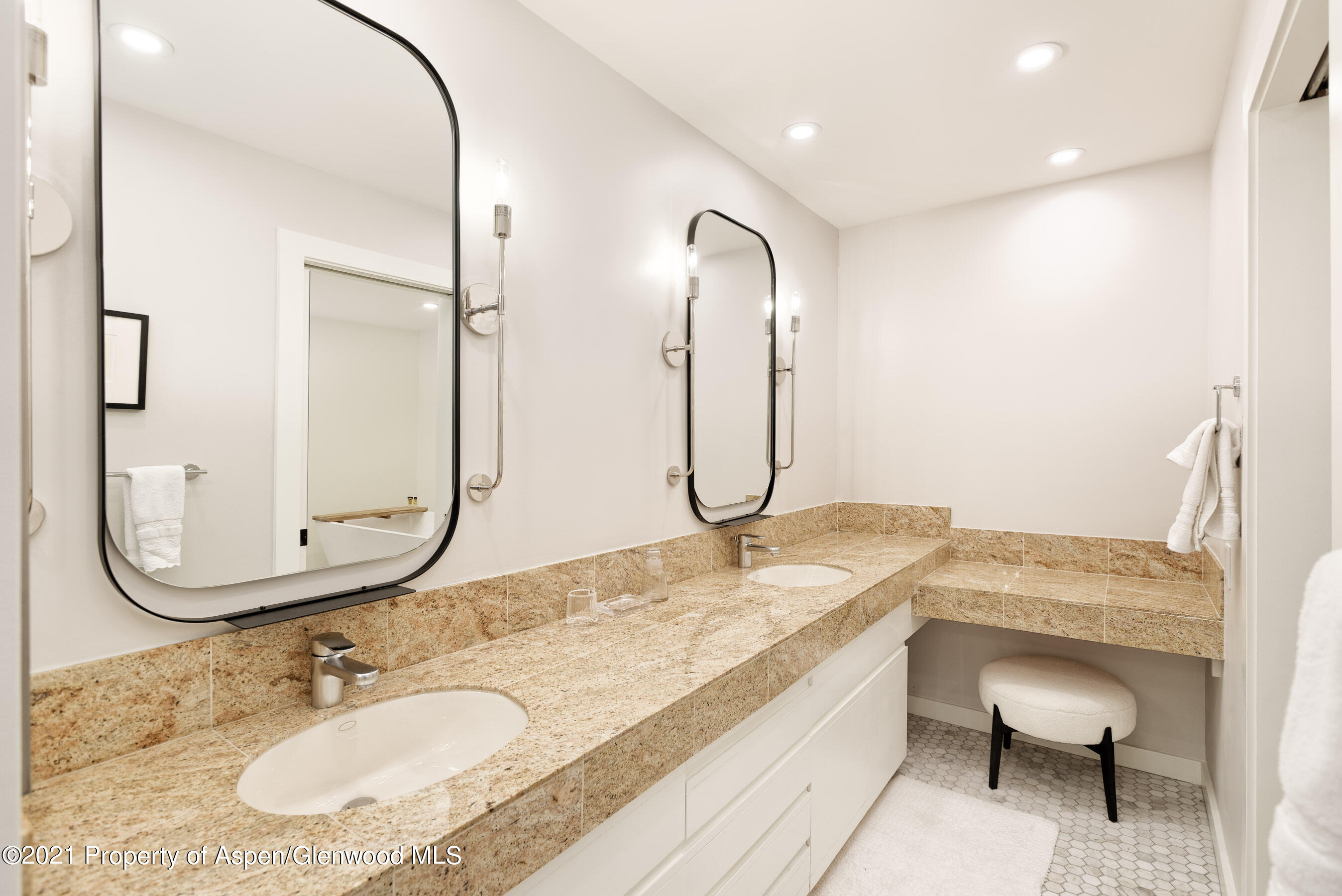 810 Ridge Road, Unit 2 Snowmass Village, CO 81615 - Photo 9 of 31 a bathroom with a granite countertop double vanity sink and a mirror