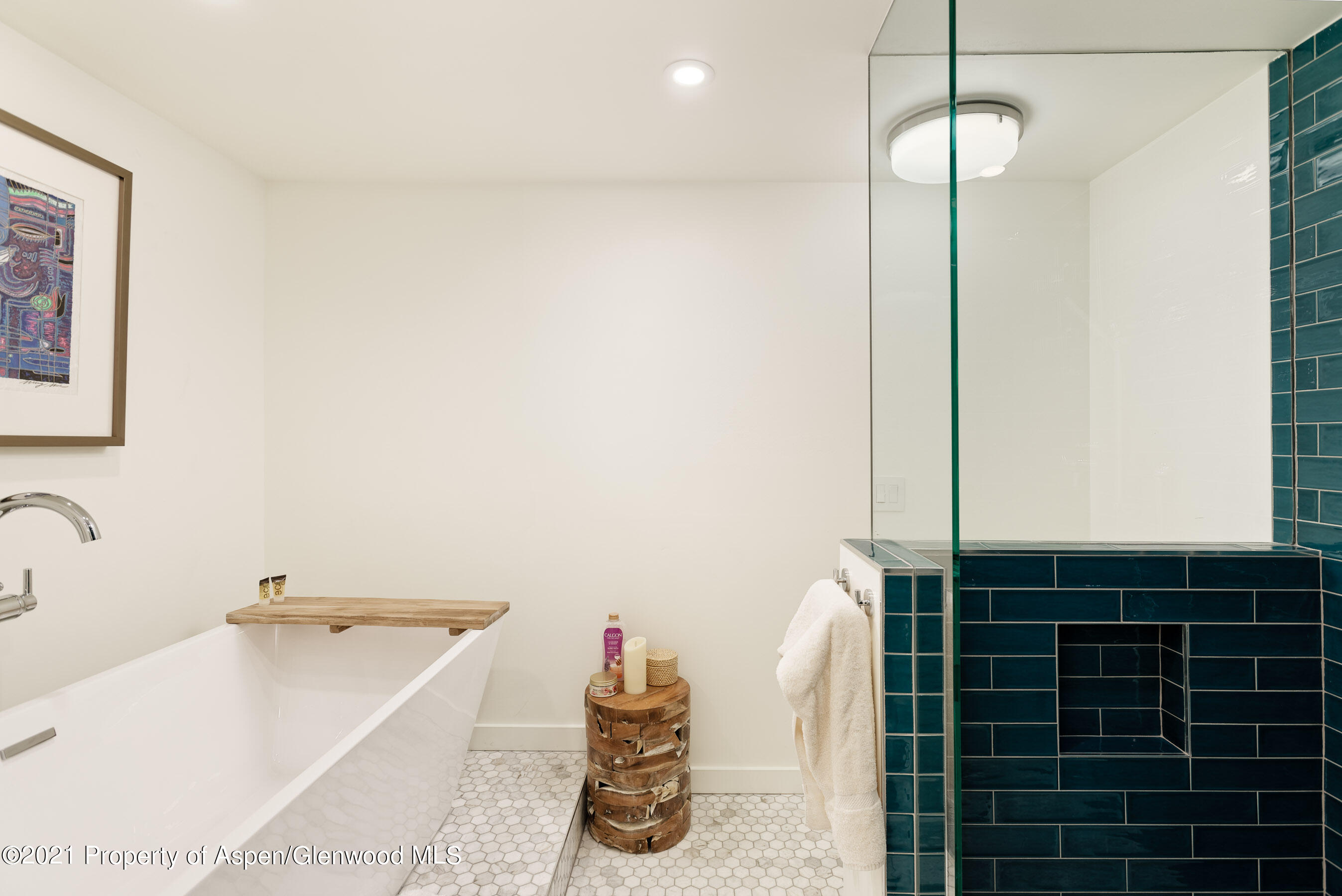 810 Ridge Road, Unit 2 Snowmass Village, CO 81615 - Photo 10 of 31 a bathroom with a tub and a shower