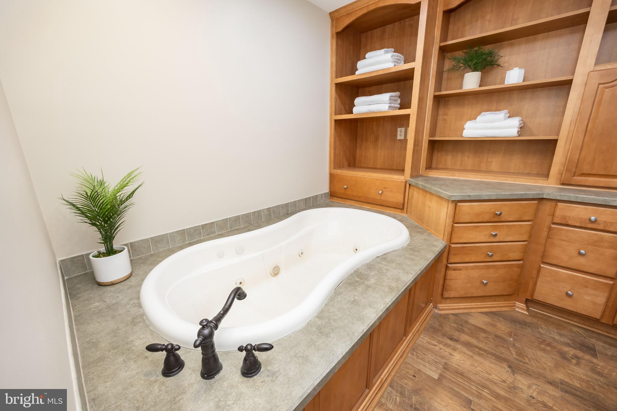 6635 Libertytown Road Berlin, MD 21811 - Photo 35 of 88 a spacious bedroom with a bed and a window