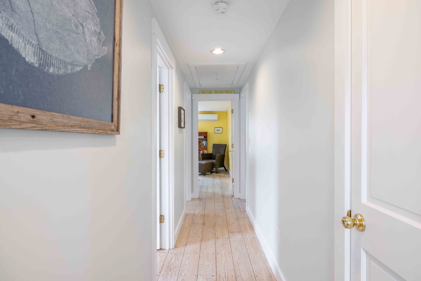 15 Goldfinch Drive Nantucket, MA 02554 - Photo 10 of 19 a view of a hallway with wooden floor and a bathroom