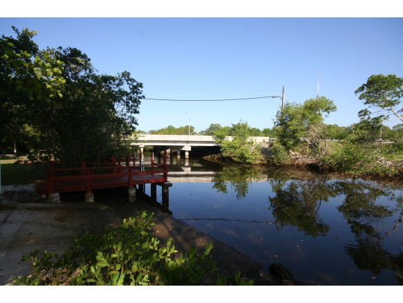 120 Audubon Road Naples, FL 34114 - Photo 11 of 11 a view of a lake with outdoor space