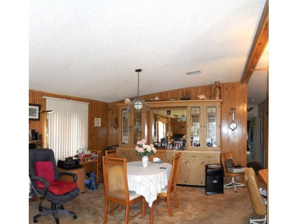 120 Audubon Road Naples, FL 34114 - Photo 4 of 11 a room with gym equipment