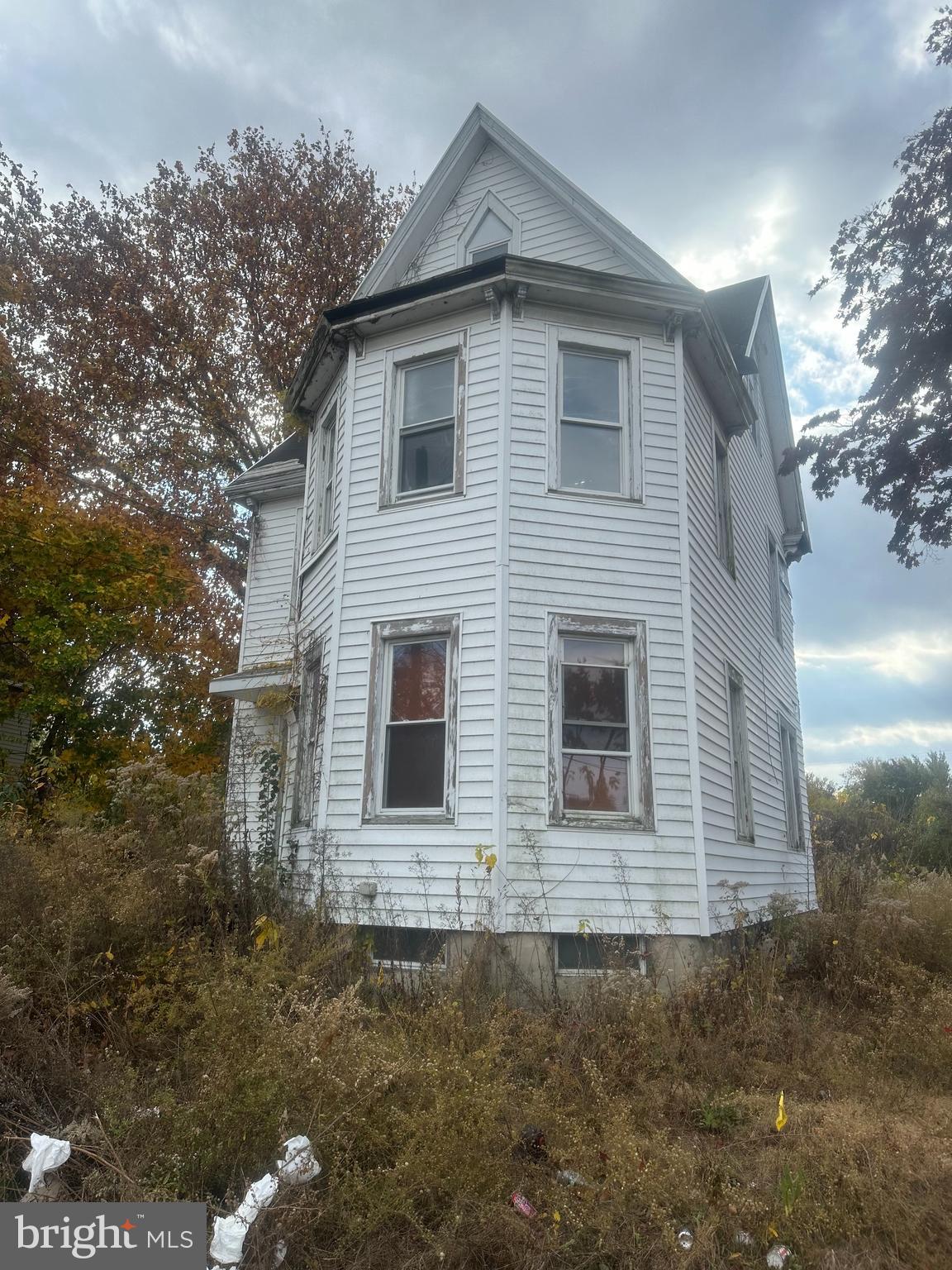 18 Pearl Street Penns Grove, NJ 08069 - Photo 3 of 15 a view of front of house with garage