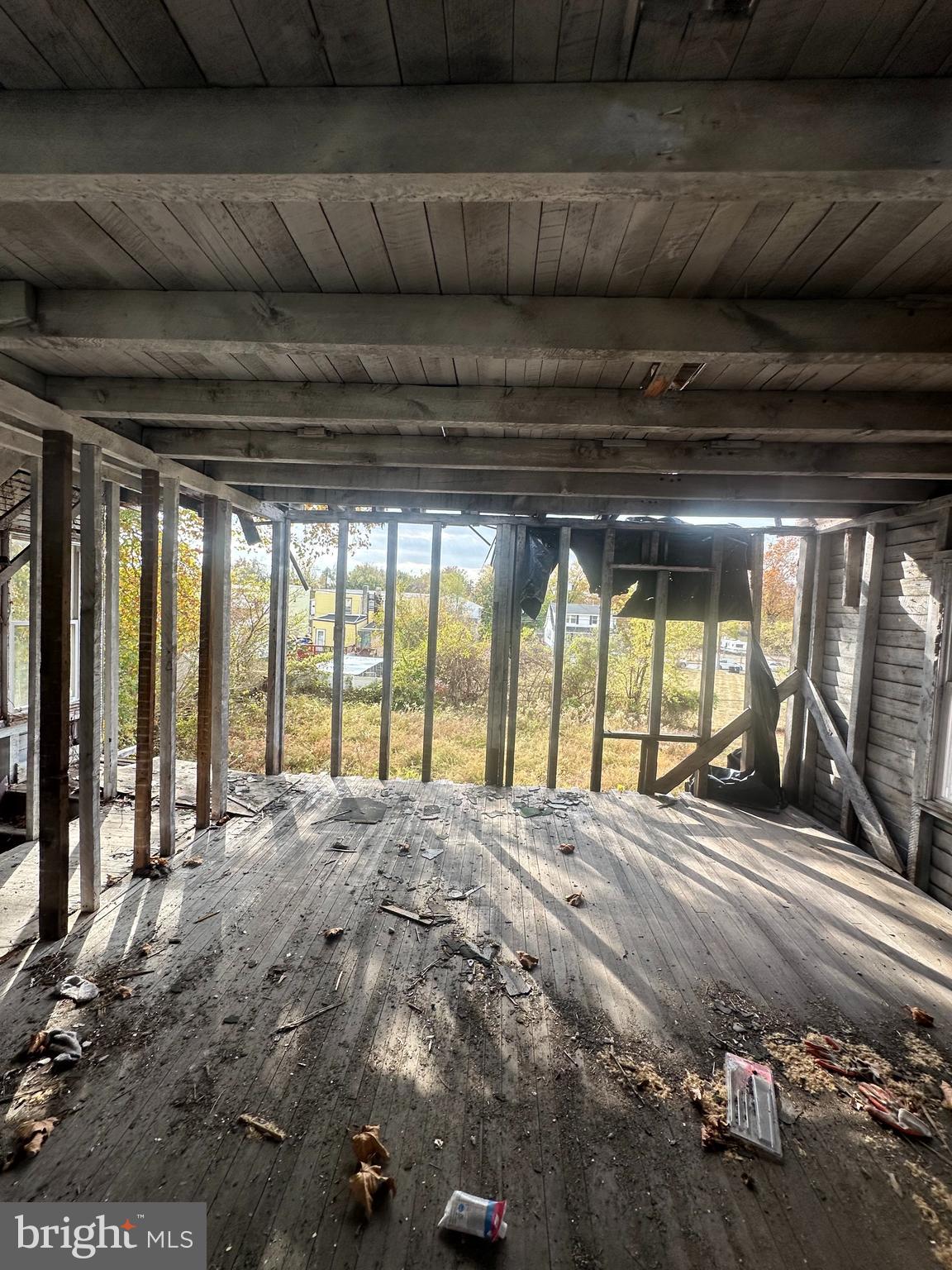 18 Pearl Street Penns Grove, NJ 08069 - Photo 8 of 15 a large bed sitting in a bedroom next to a large window