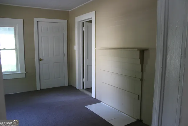 an empty room with windows