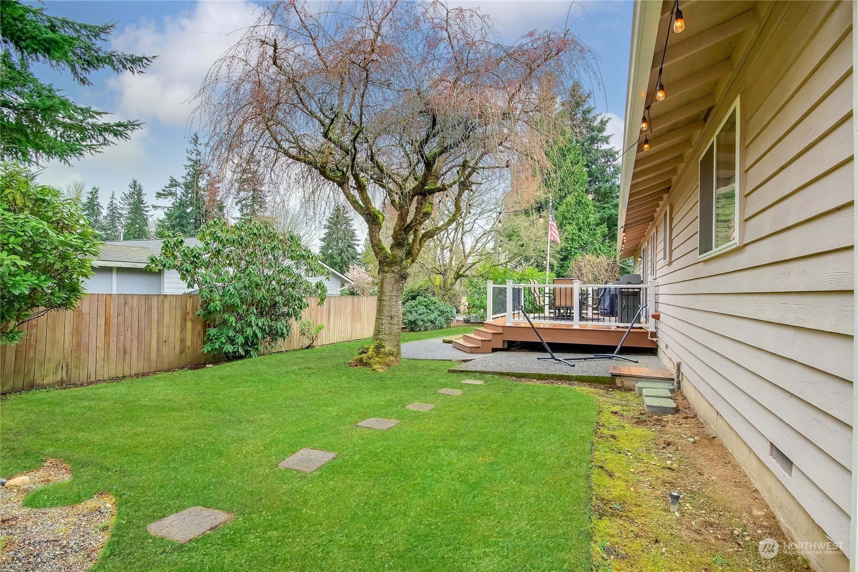 17517 30th Drive Southeast Bothell, WA 98012 - Photo 22 of 24 a view of a backyard with sitting area
