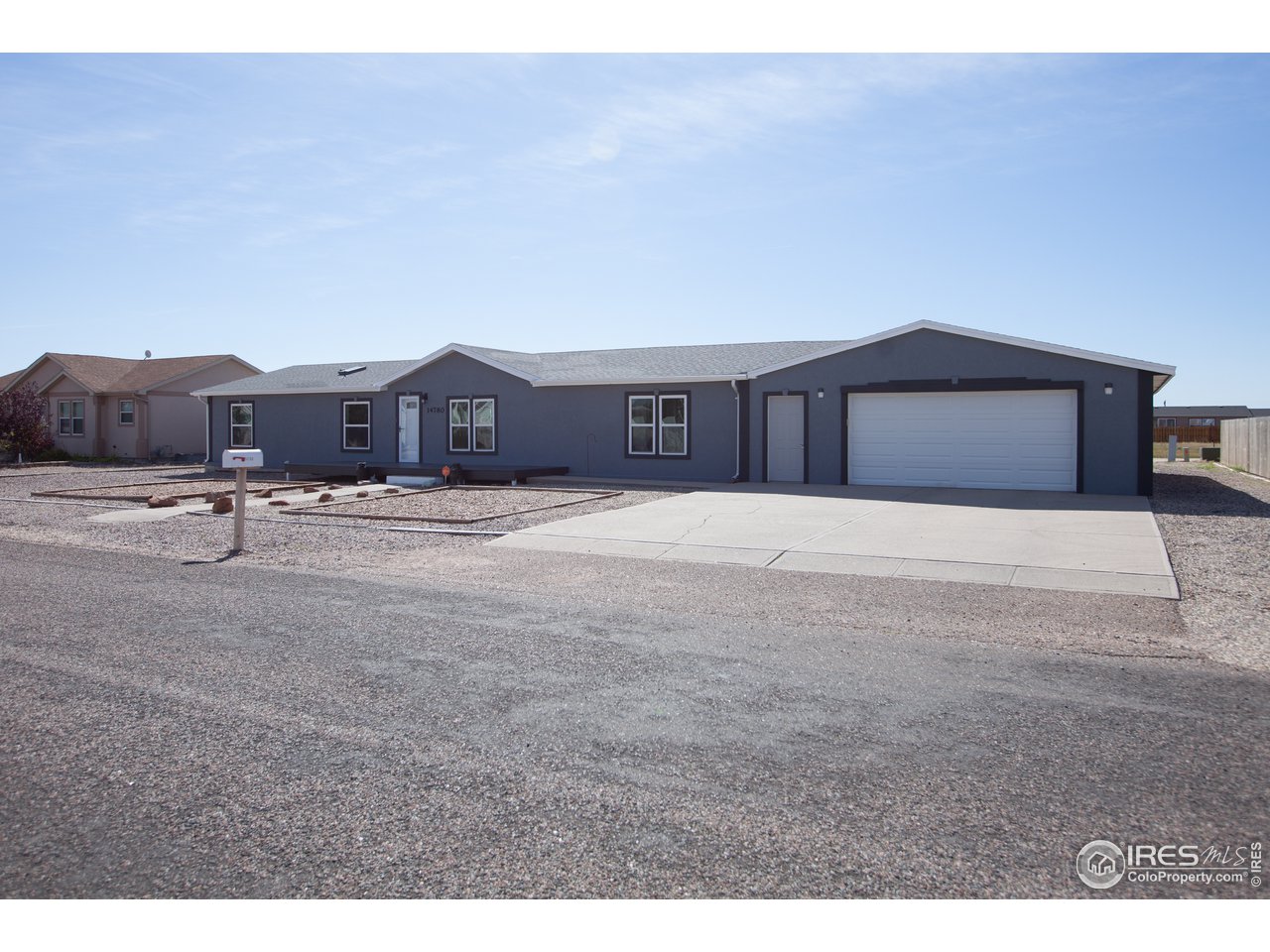 14780 Bluestem Street Sterling, CO 80751 - Photo 2 of 40 a view of an empty room with kitchen