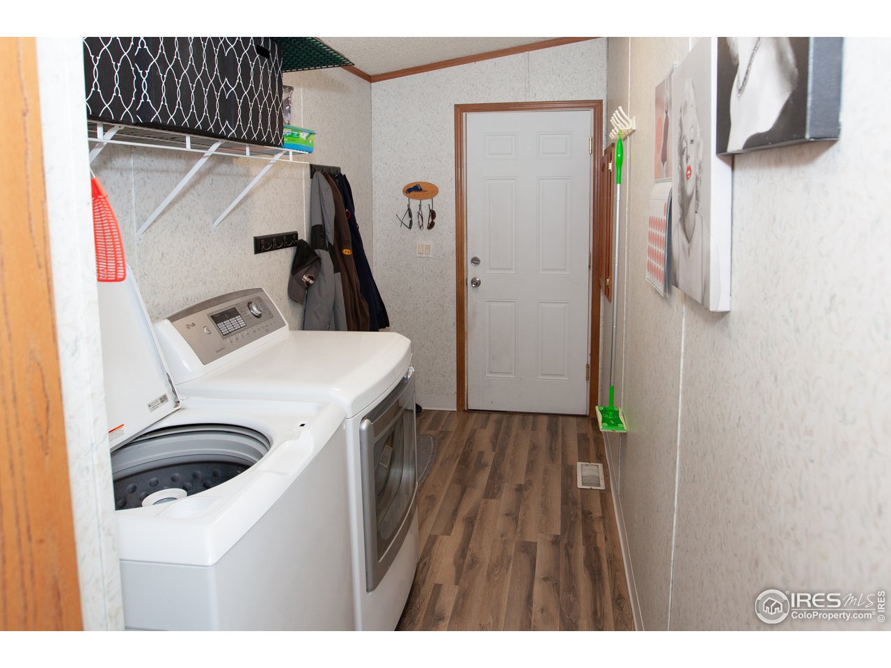 14780 Bluestem Street Sterling, CO 80751 - Photo 33 of 40 a utility room with dryer and washer
