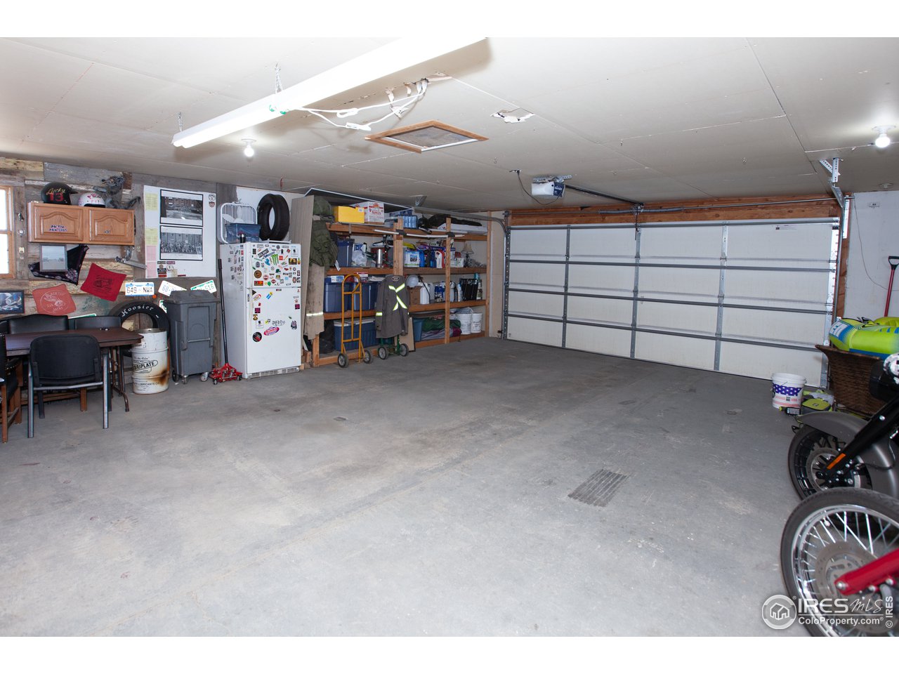 14780 Bluestem Street Sterling, CO 80751 - Photo 39 of 40 a view of a garage with storage