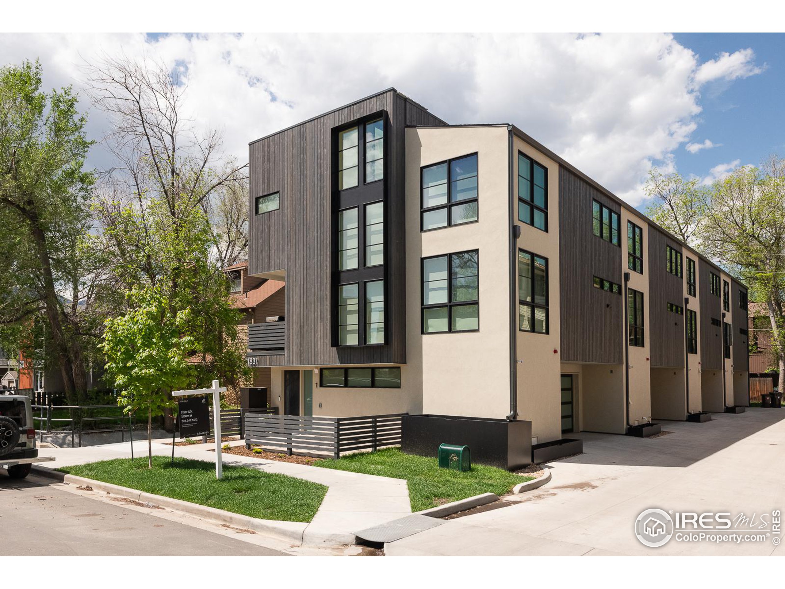 1831 22nd Street, Unit 2 Boulder, CO 80302 - Photo 1 of 39 a front view of a building with street view