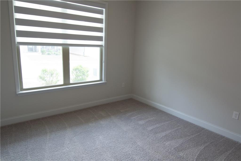 2472 Knob Crk Road Snellville, GA 30078 - Photo 16 of 30 an empty room with a window