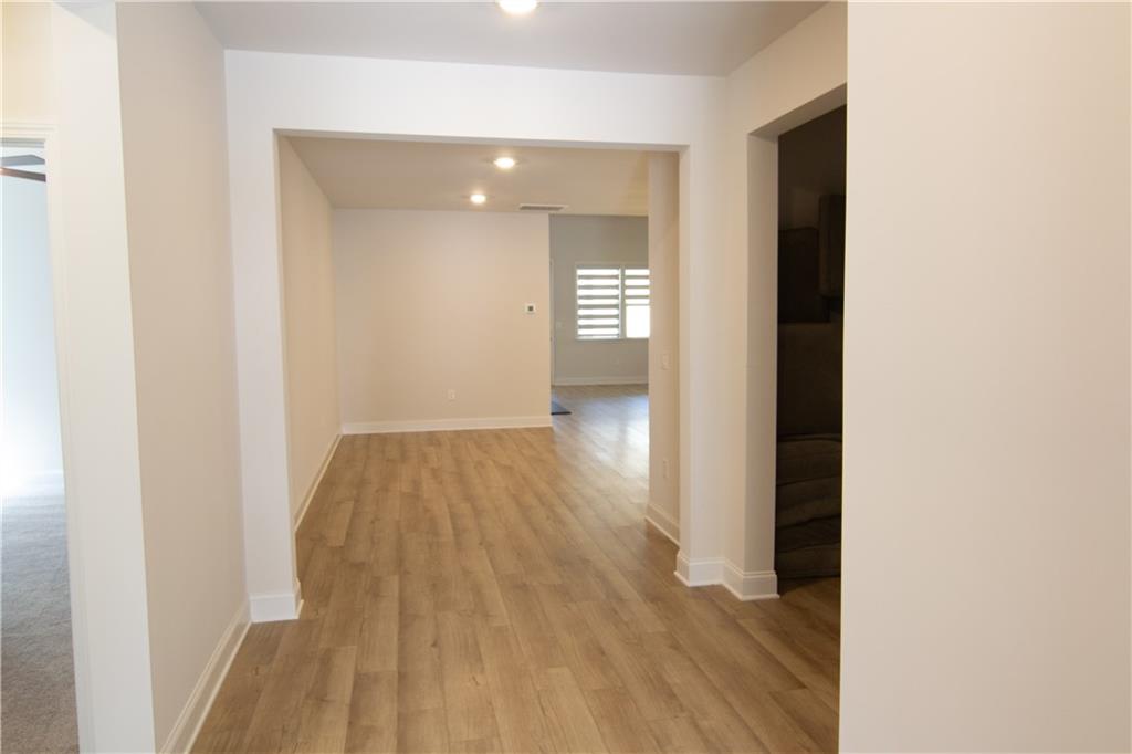 2472 Knob Crk Road Snellville, GA 30078 - Photo 2 of 30 a view of a room with wooden floor and a bathroom