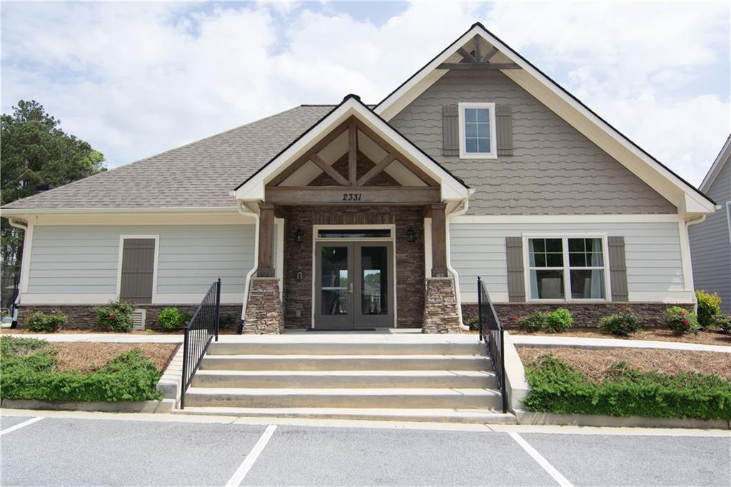 2472 Knob Crk Road Snellville, GA 30078 - Photo 21 of 30 a front view of a house with a yard