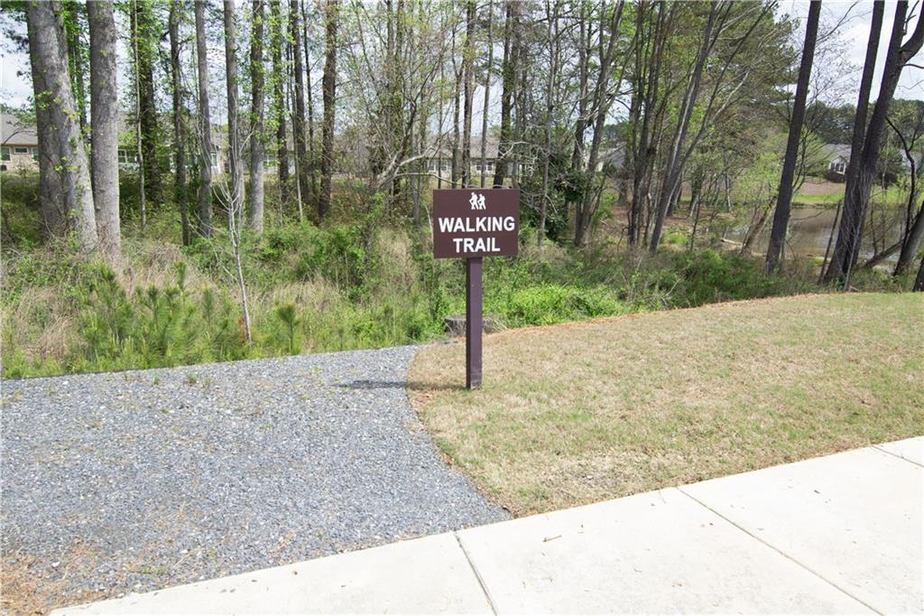 2472 Knob Crk Road Snellville, GA 30078 - Photo 22 of 30 a sign board with yard in front of it