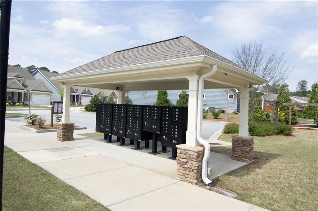 2472 Knob Crk Road Snellville, GA 30078 - Photo 28 of 30 a view of a house with porch