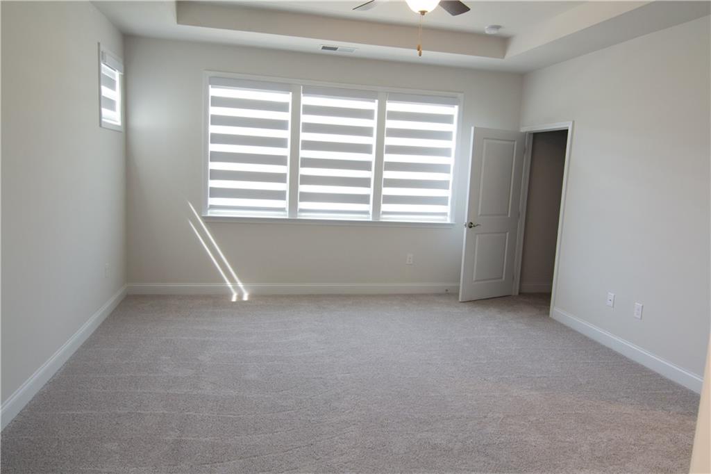 2472 Knob Crk Road Snellville, GA 30078 - Photo 8 of 30 a view of an empty room with a window