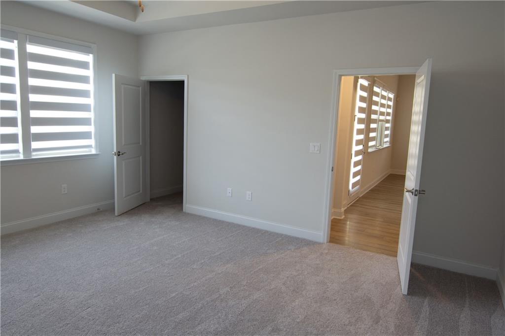 2472 Knob Crk Road Snellville, GA 30078 - Photo 9 of 30 an empty room with windows