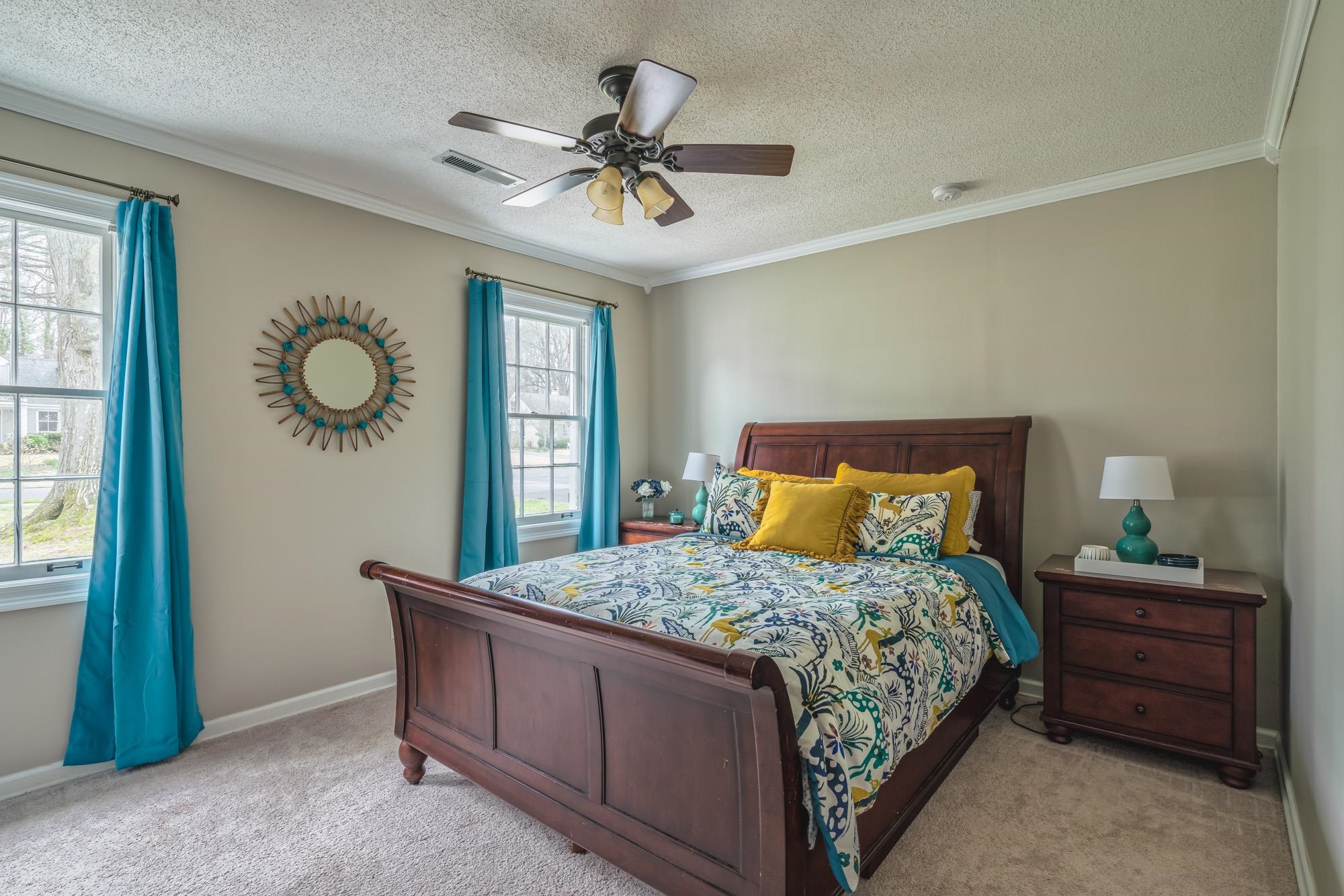 4518 Sequoia Road Memphis, TN 38117 - Photo 15 of 25 a bedroom with a bed and a table