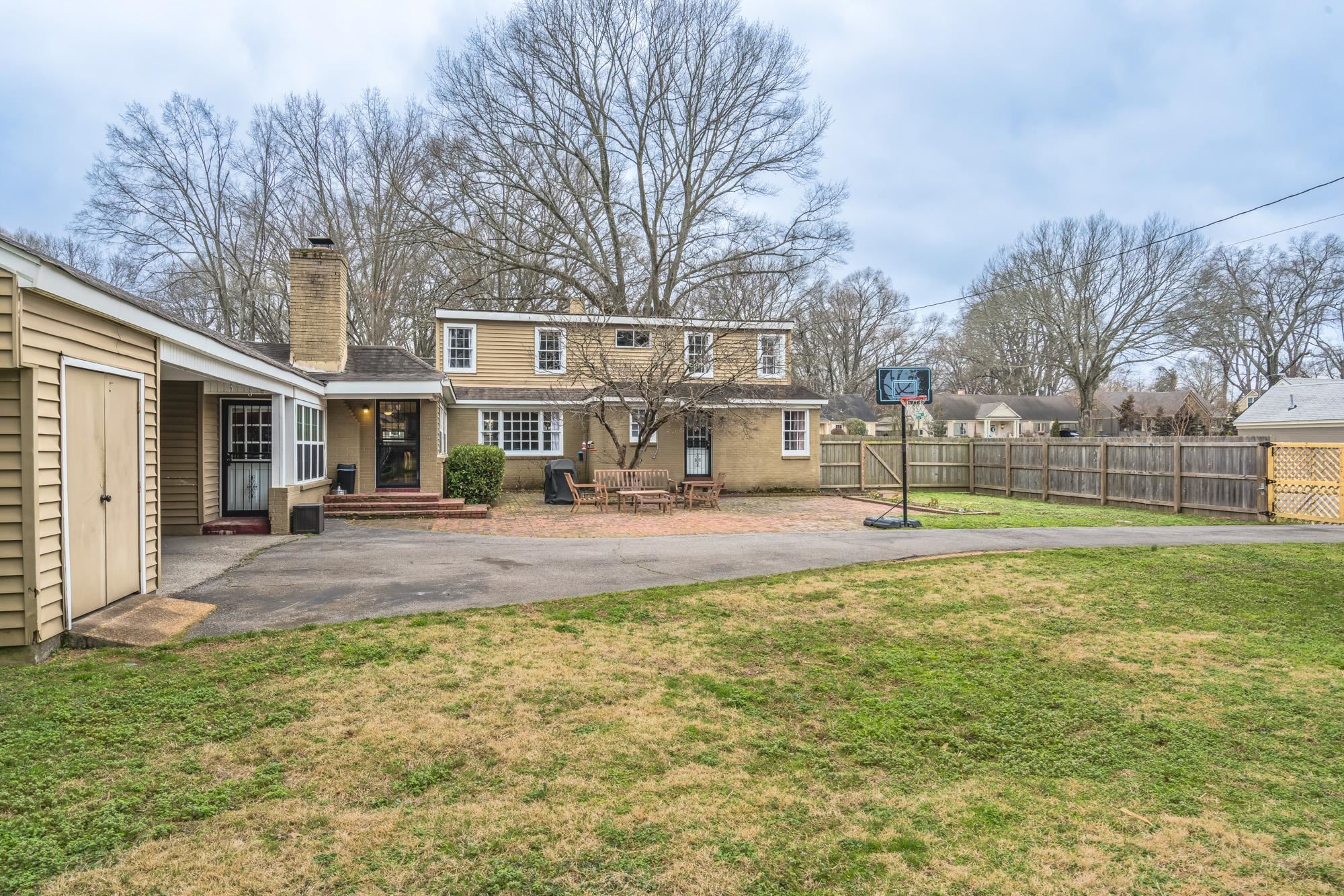 4518 Sequoia Road Memphis, TN 38117 - Photo 24 of 25 a view of a house with swimming pool and sitting area