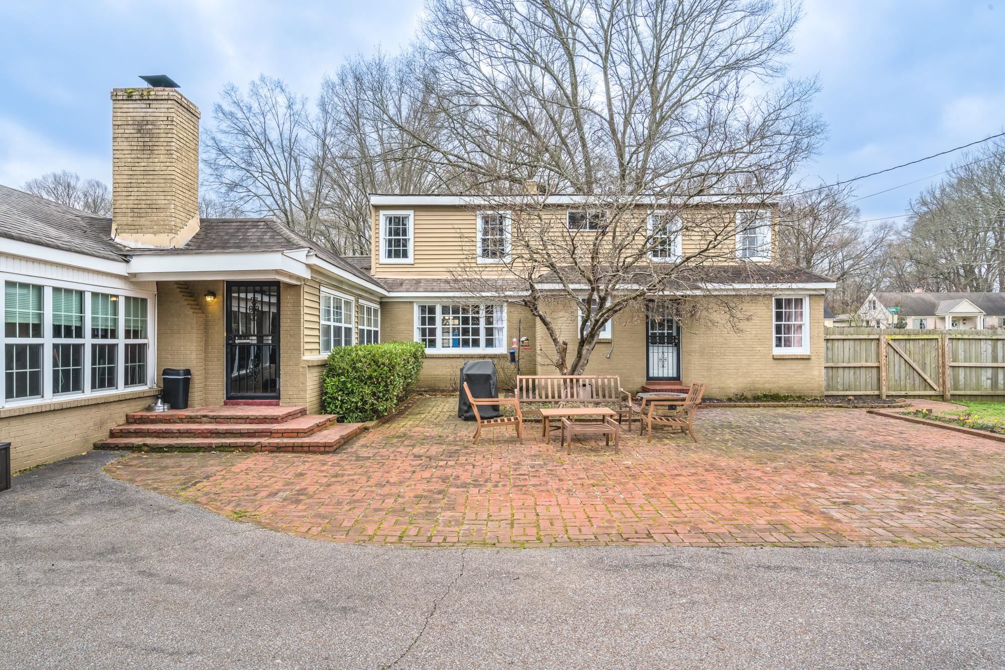 4518 Sequoia Road Memphis, TN 38117 - Photo 25 of 25 a view of a house with backyard and sitting area