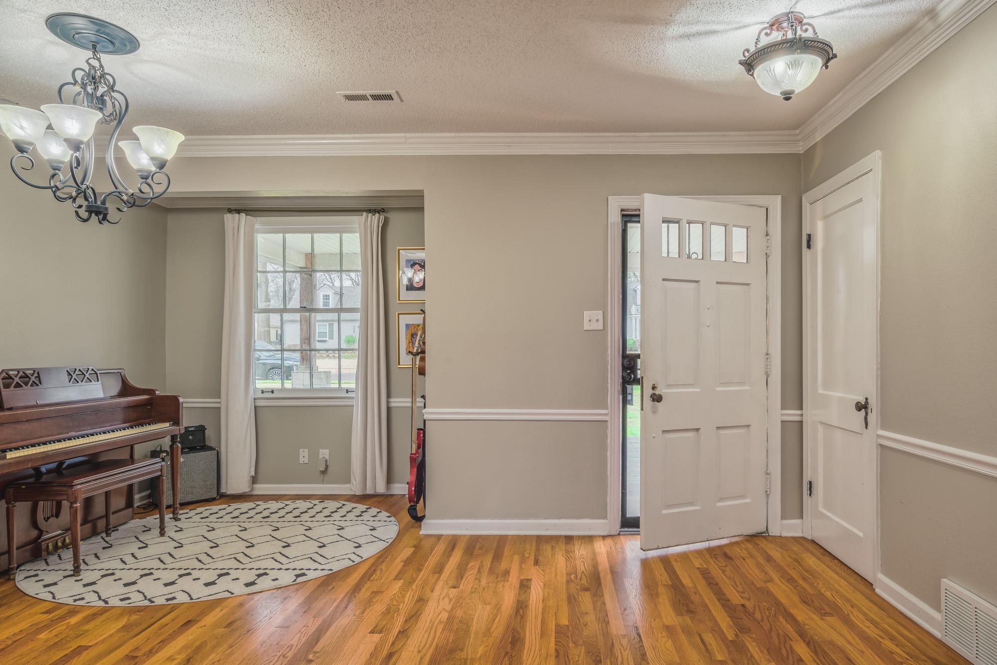 4518 Sequoia Road Memphis, TN 38117 - Photo 4 of 25 a view of a livingroom with wooden floor