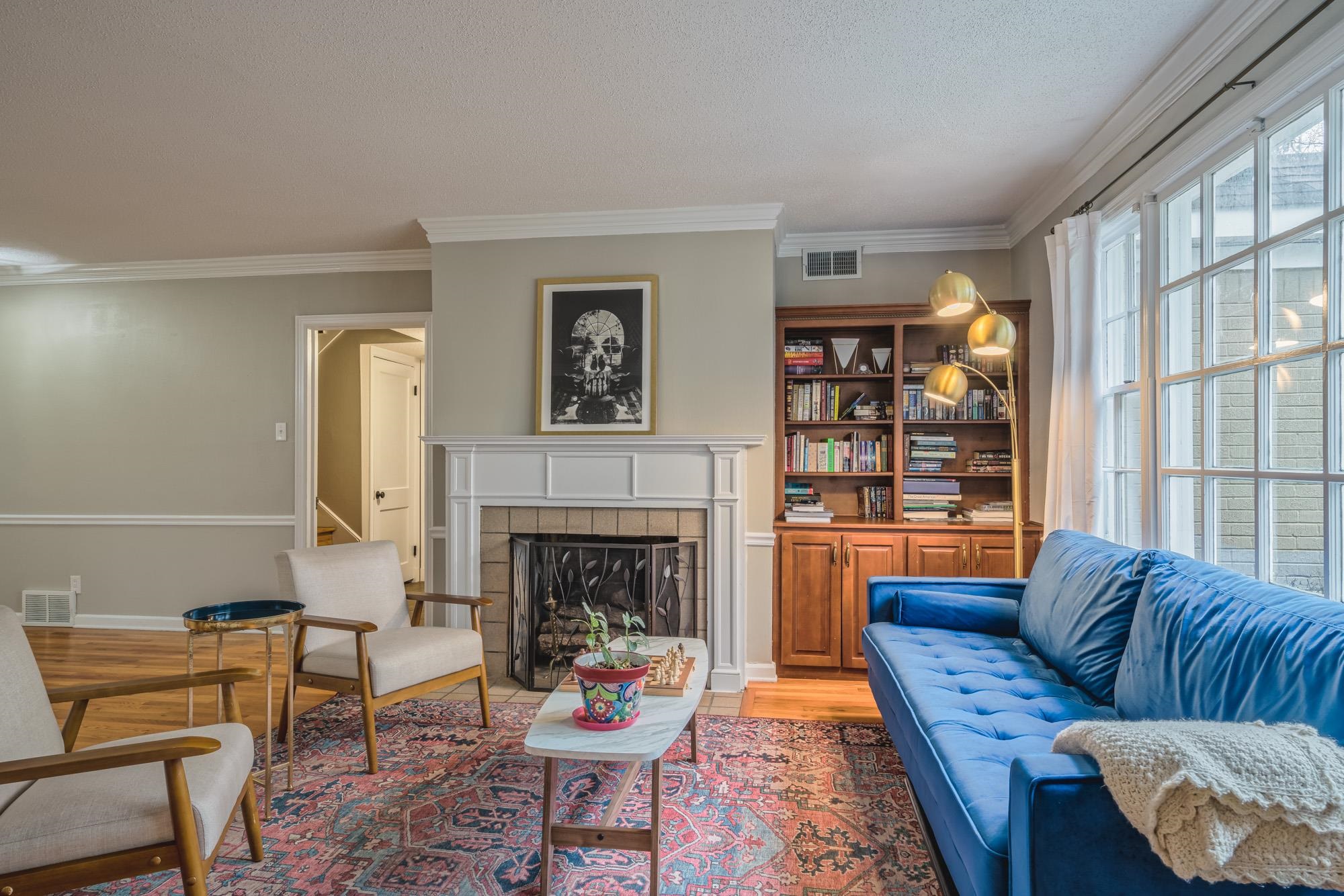4518 Sequoia Road Memphis, TN 38117 - Photo 6 of 25 a living room with furniture fireplace and window
