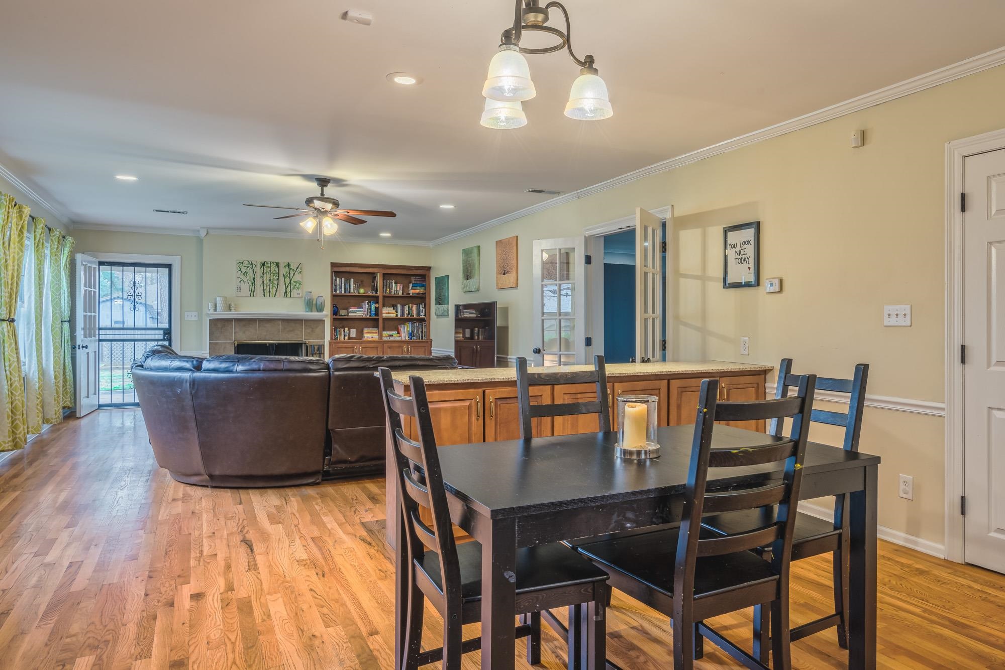 4518 Sequoia Road Memphis, TN 38117 - Photo 9 of 25 a view of a dining room with furniture window and wooden floor