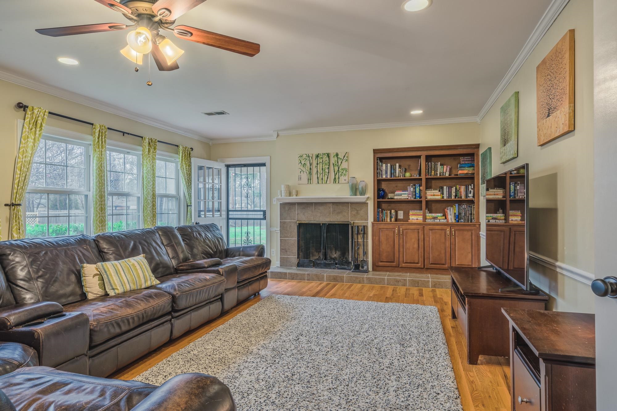 4518 Sequoia Road Memphis, TN 38117 - Photo 10 of 25 a living room with furniture fireplace and window