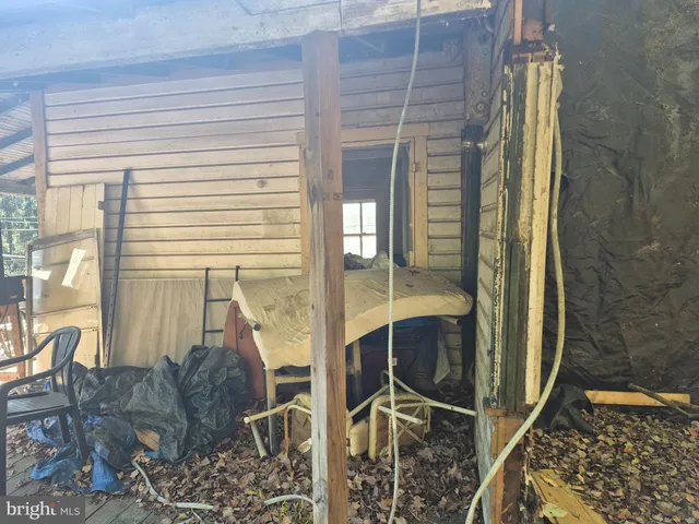 a view of a porch with furniture