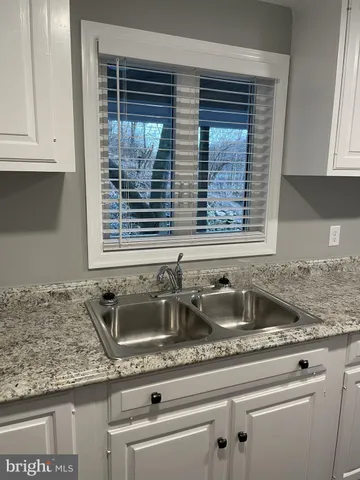 a close view of sink and window