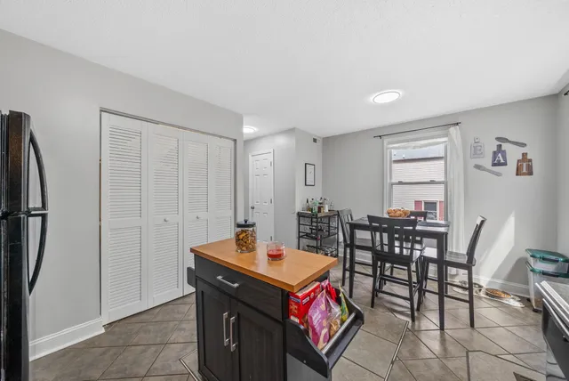 a view of a livingroom with furniture and window