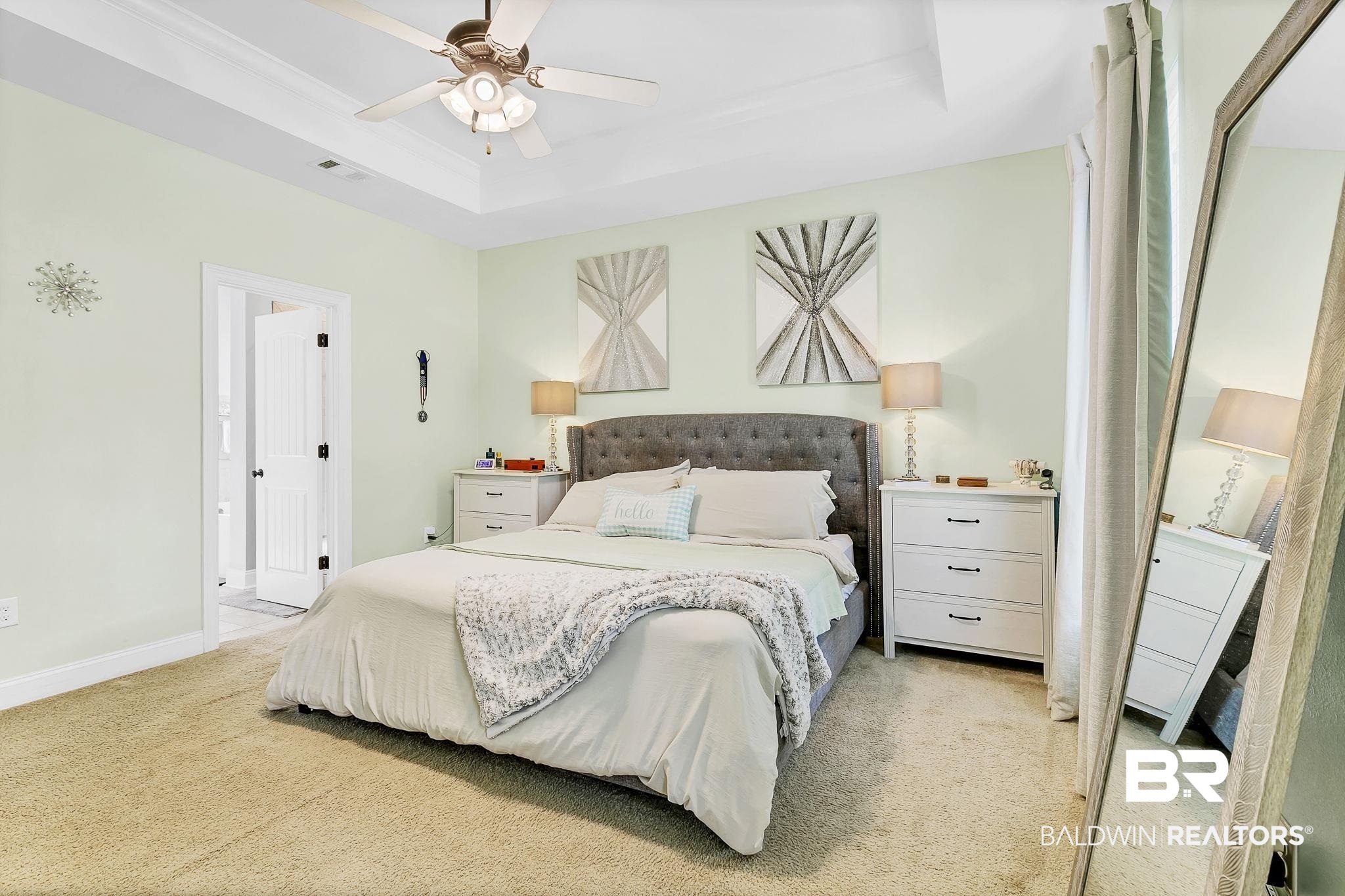 30635 Drayton Court Daphne, AL 36527 - Photo 21 of 51 Bedroom with a tray ceiling, light carpet, baseboards, and a ceiling fan