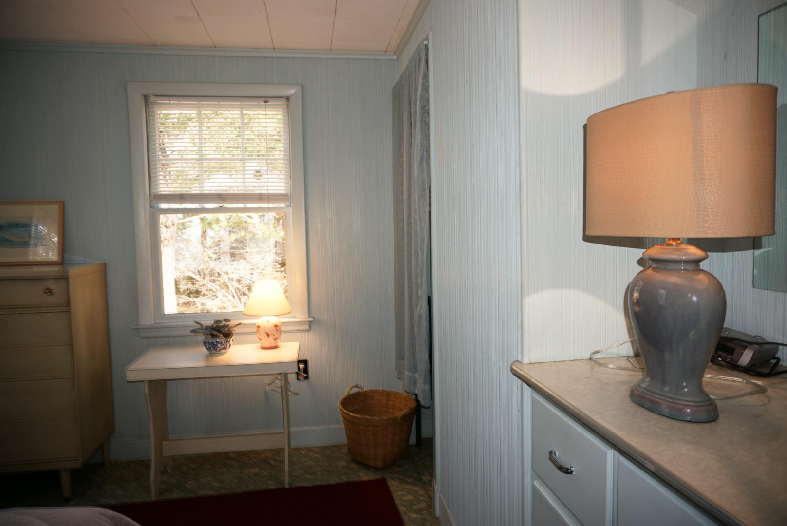 124 Castle Road, Unit 5 Truro, MA 02666 - Photo 12 of 22 a room with a window closet and wooden floor