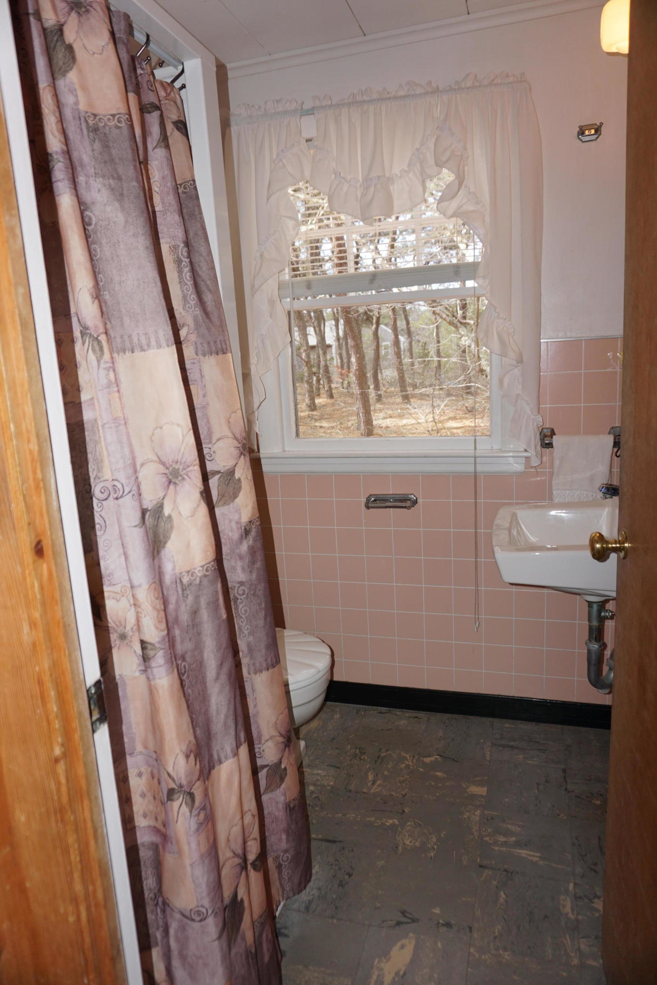 124 Castle Road, Unit 5 Truro, MA 02666 - Photo 13 of 22 a bathroom with a granite countertop sink and a mirror