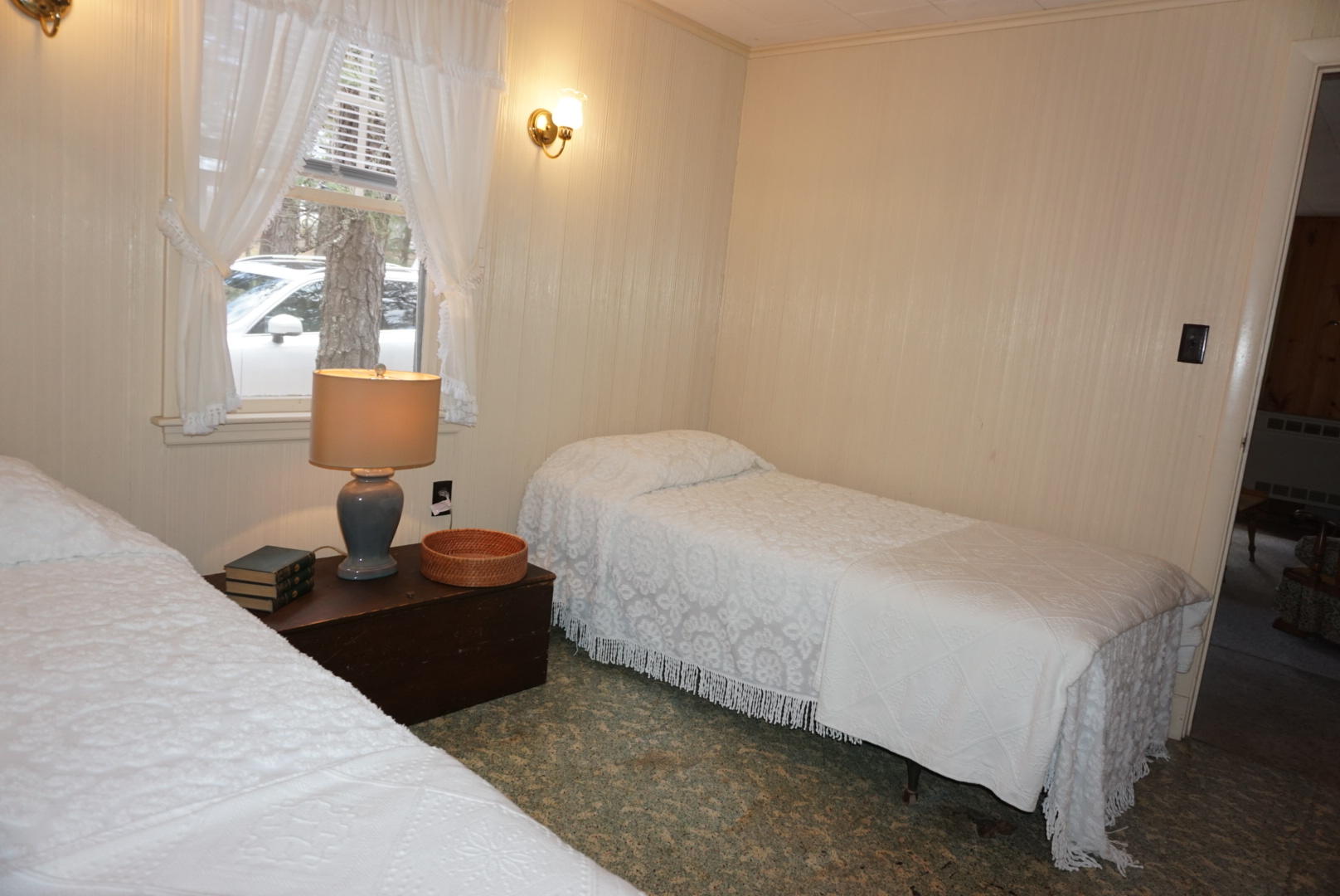 124 Castle Road, Unit 5 Truro, MA 02666 - Photo 17 of 22 a bedroom with a bed and window