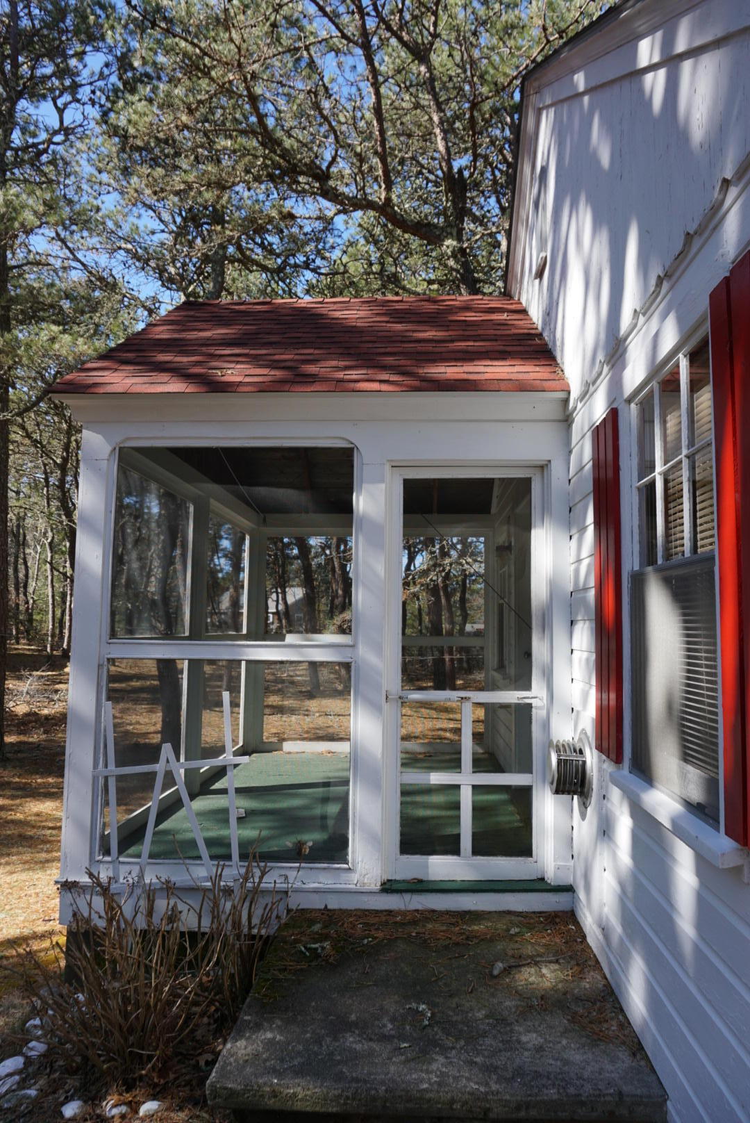 124 Castle Road, Unit 5 Truro, MA 02666 - Photo 21 of 22 a view of a house with door and porch