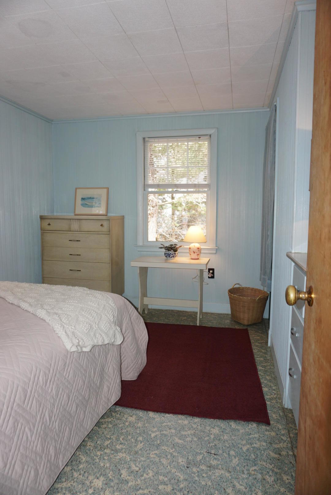 124 Castle Road, Unit 5 Truro, MA 02666 - Photo 10 of 22 a bedroom with a bed and a window