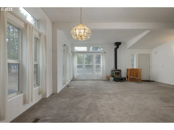 a view of a livingroom with a furniture