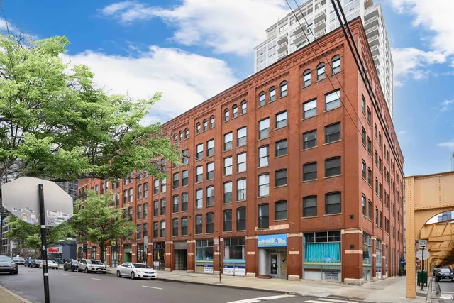 a view of a building with a street