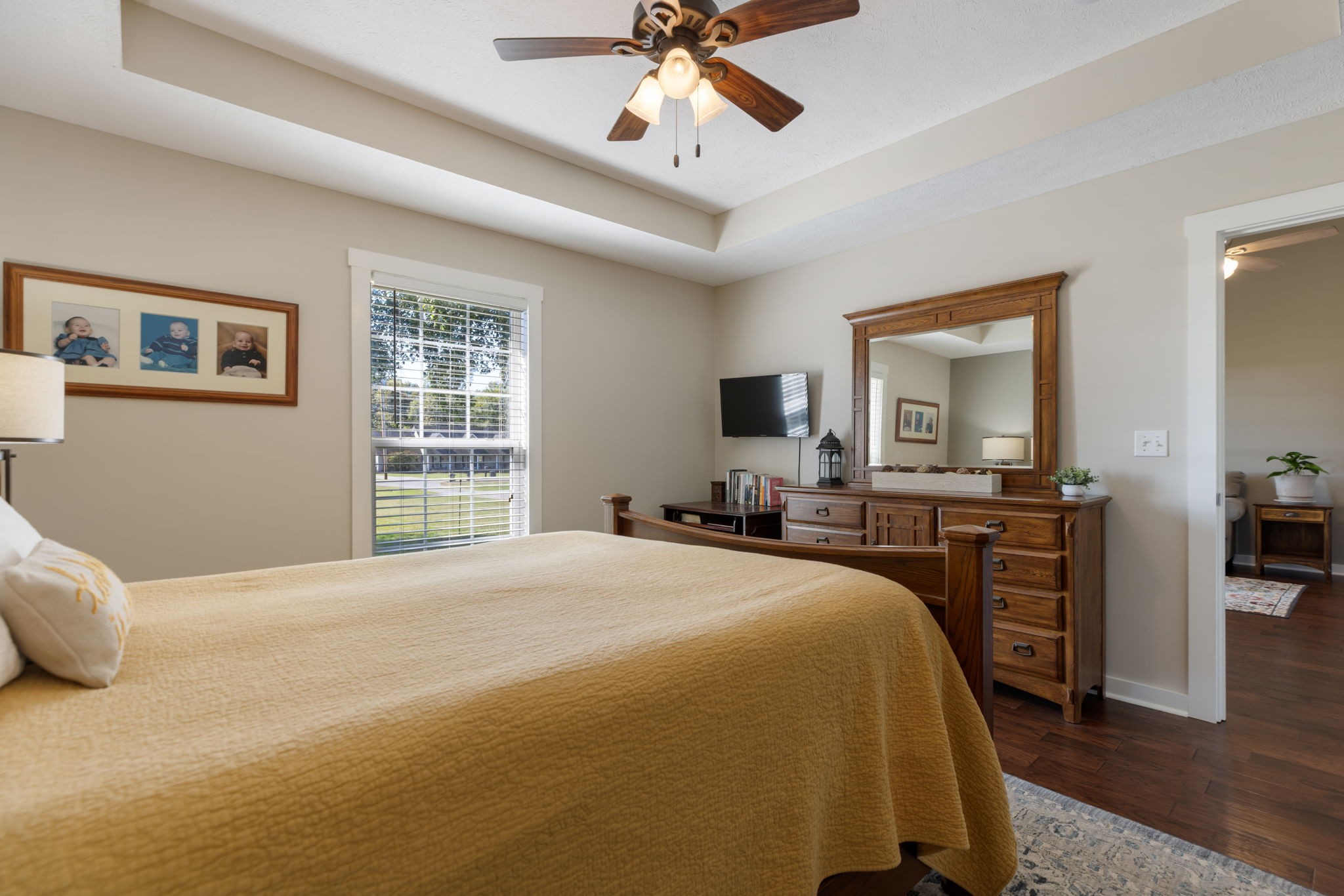 2118 Horton Way Lewisburg, TN 37091 - Photo 16 of 58 a bedroom with a bed and a chandelier