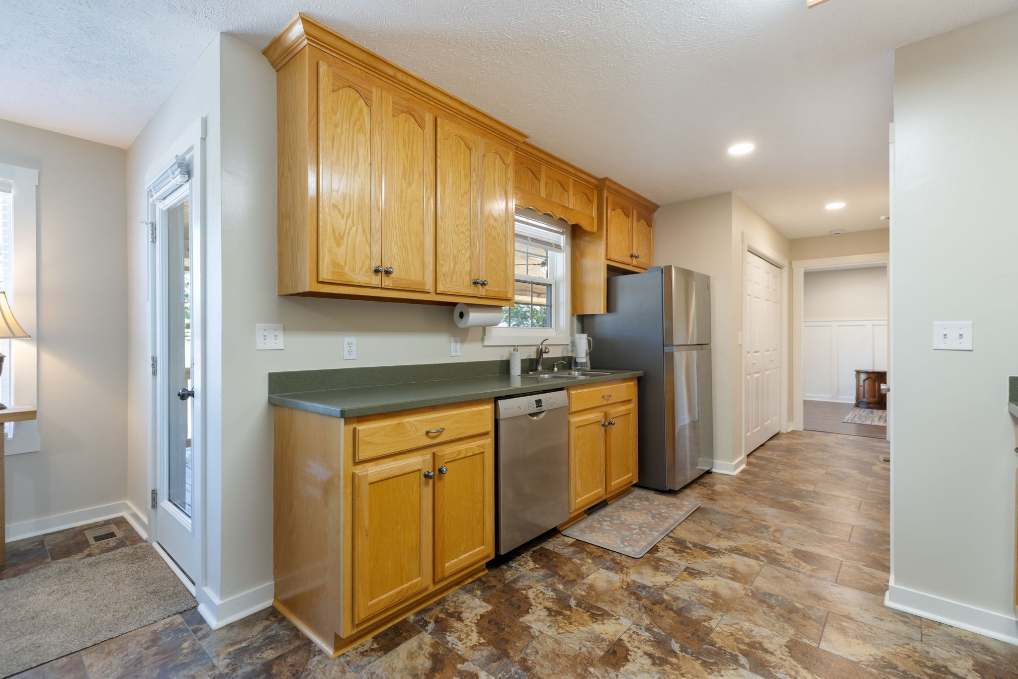 2118 Horton Way Lewisburg, TN 37091 - Photo 31 of 58 a kitchen with stainless steel appliances granite countertop a refrigerator and a stove top oven