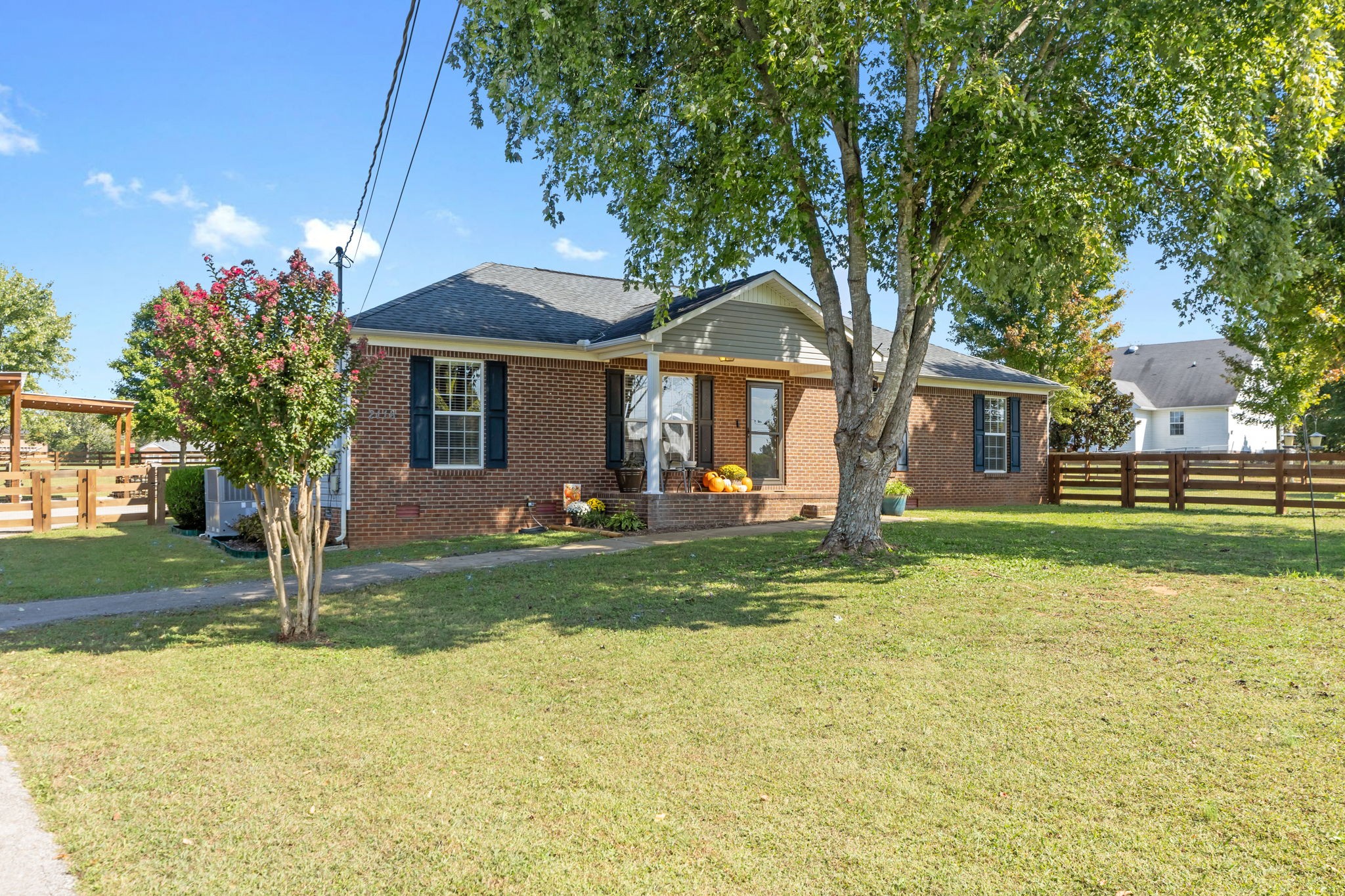 2118 Horton Way Lewisburg, TN 37091 - Photo 5 of 58 a front view of a house with a yard