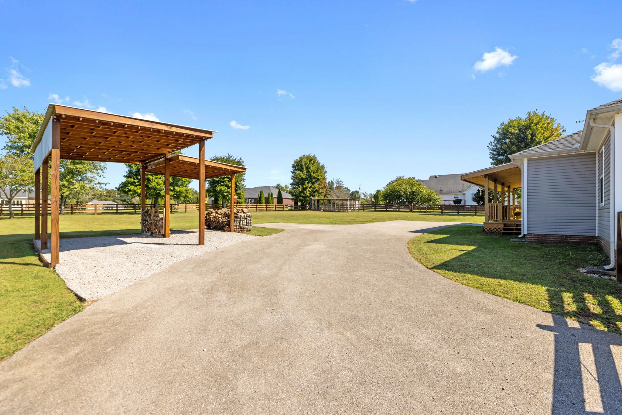 2118 Horton Way Lewisburg, TN 37091 - Photo 55 of 58 a view of a house with a yard and a garage