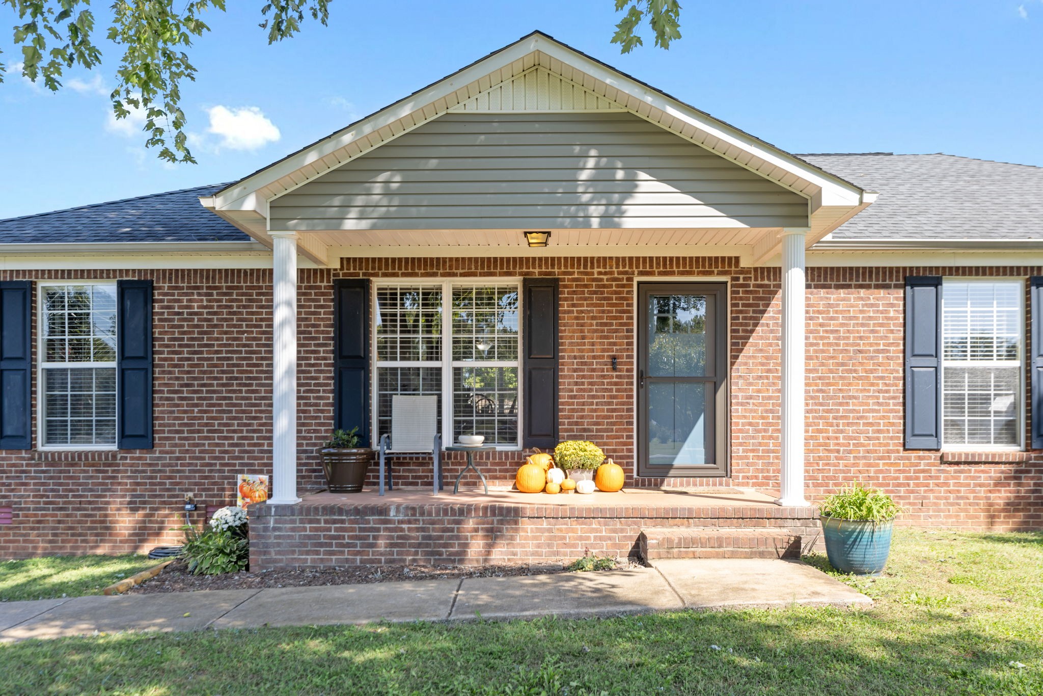 2118 Horton Way Lewisburg, TN 37091 - Photo 6 of 58 a front view of a house with a yard