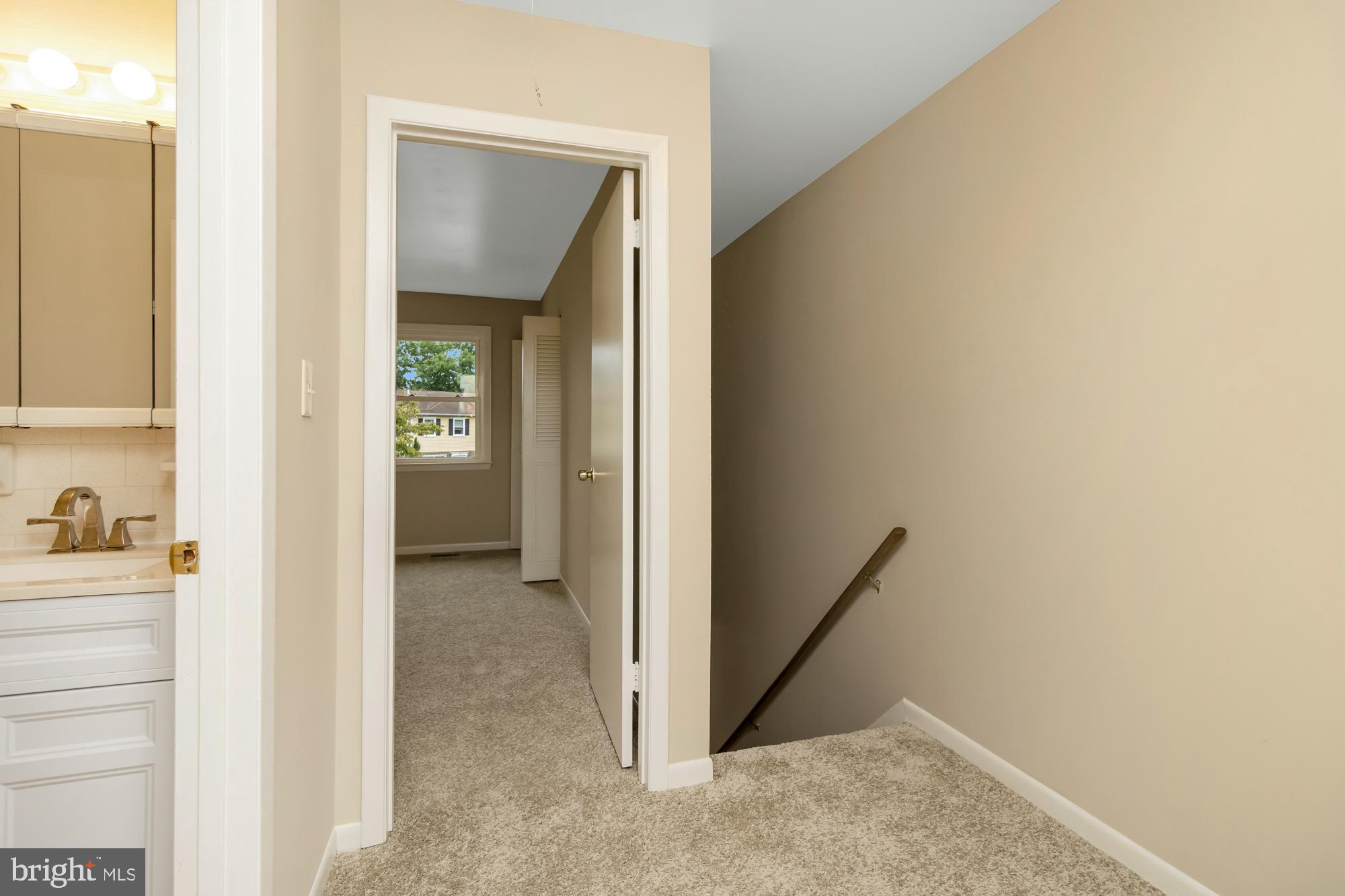3640 Rockberry Road Baltimore, MD 21234 - Photo 14 of 37 a view of a hallway with closet and a hallway