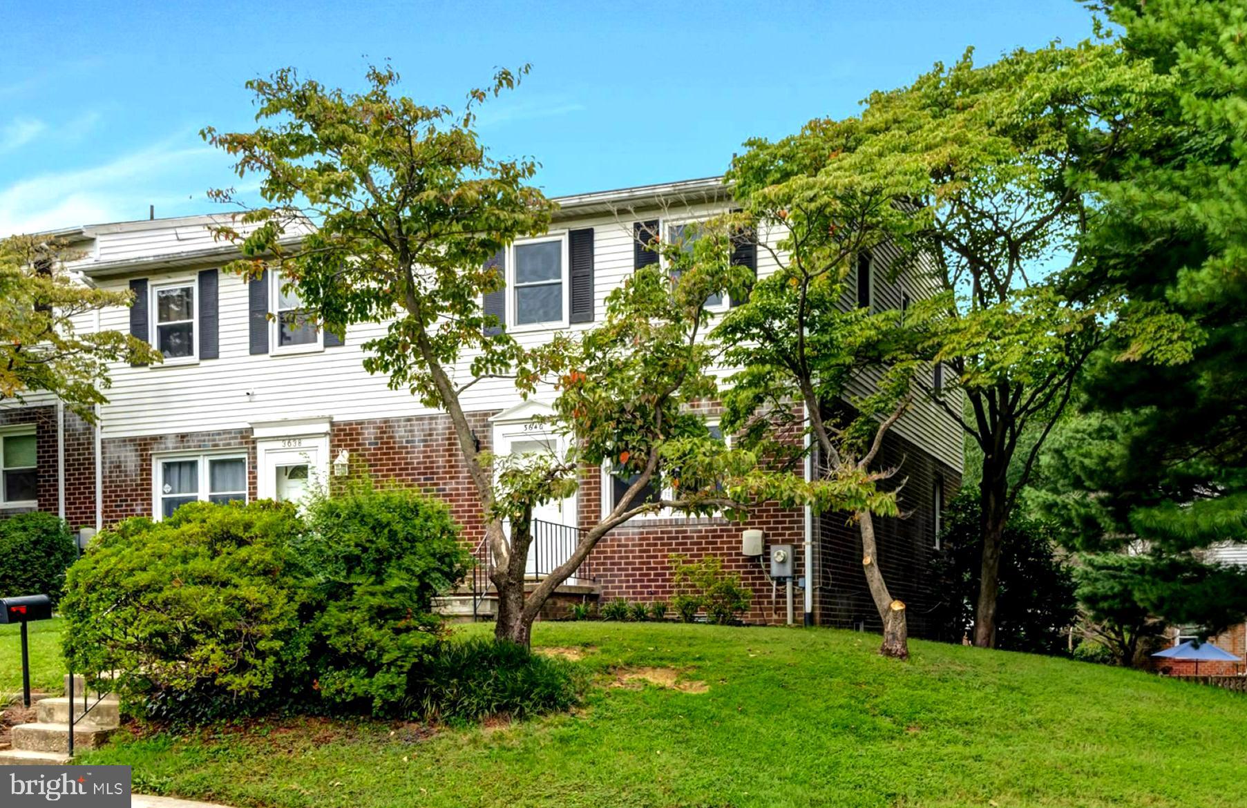 3640 Rockberry Road Baltimore, MD 21234 - Photo 2 of 37 front view of a house with a garden