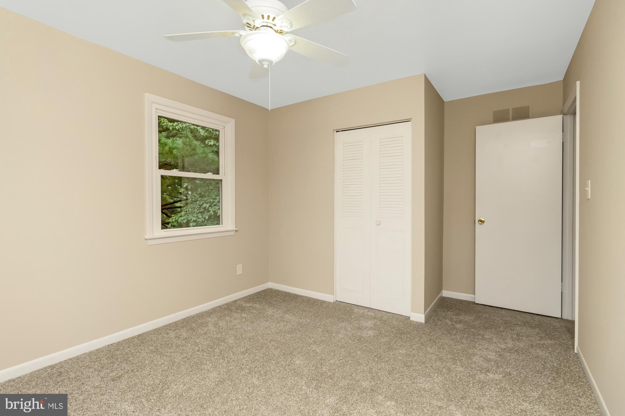 3640 Rockberry Road Baltimore, MD 21234 - Photo 21 of 37 a view of an empty room with a window