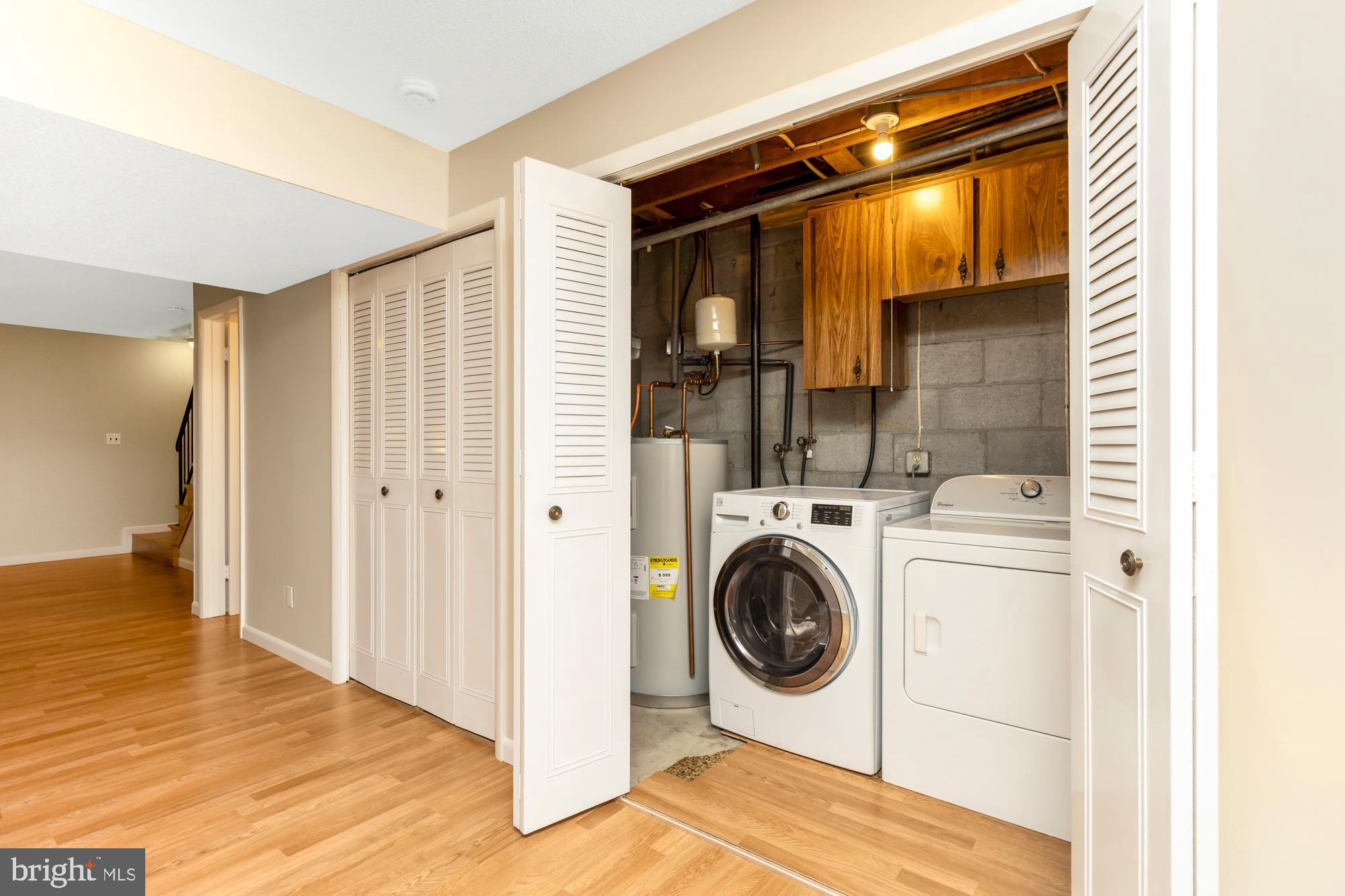 3640 Rockberry Road Baltimore, MD 21234 - Photo 28 of 37 a view of a storage & utility room with washer and dryer
