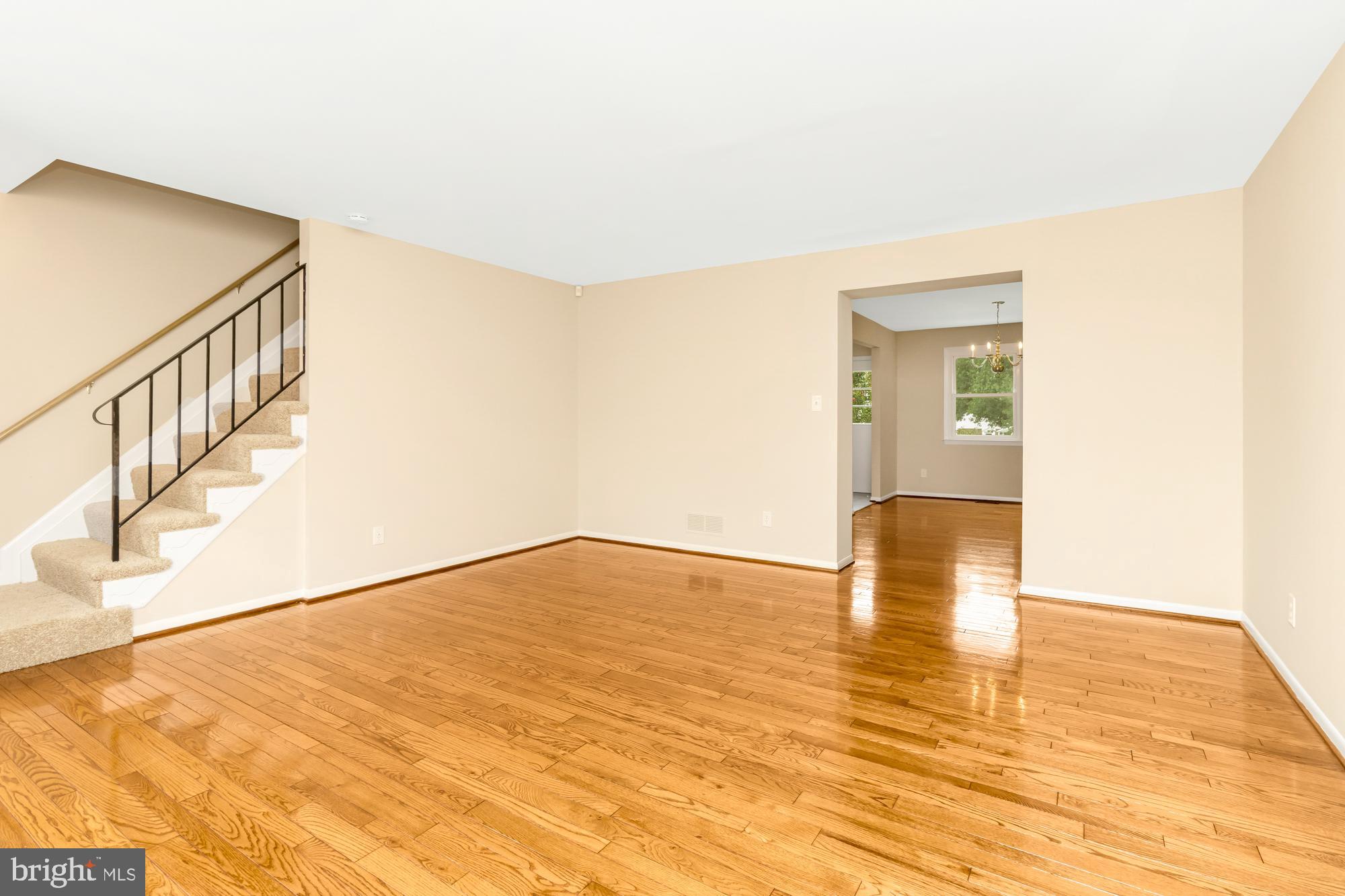 3640 Rockberry Road Baltimore, MD 21234 - Photo 4 of 37 a view of empty room with wooden floor